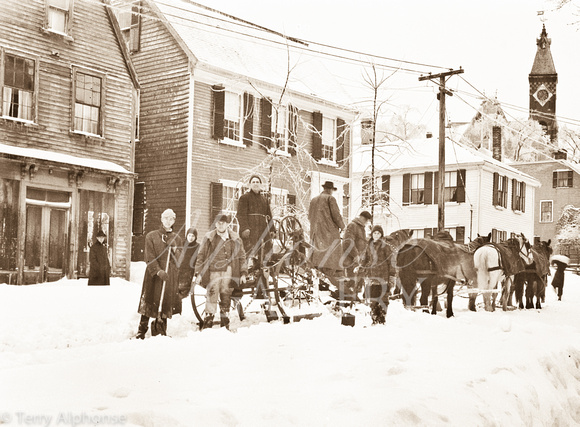 Snow clearing on Washington Street, at Mason Street - starting at 164 Washington from the far left. 7 February, 1920. Marblehead, Mass. Abbot Hall can be seen in the distance.