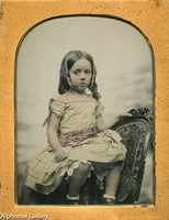 J. Gurney 4th Plate Ambrotype - Girl in Yellow Dress Grasping the "Gurney Chair"