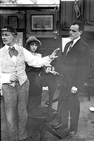 Nick S. Woods leading Muriel Ostriche and Boyd Marshall in a circa 1914 still. Courtesy of Dominick Bruzzese (X-355)